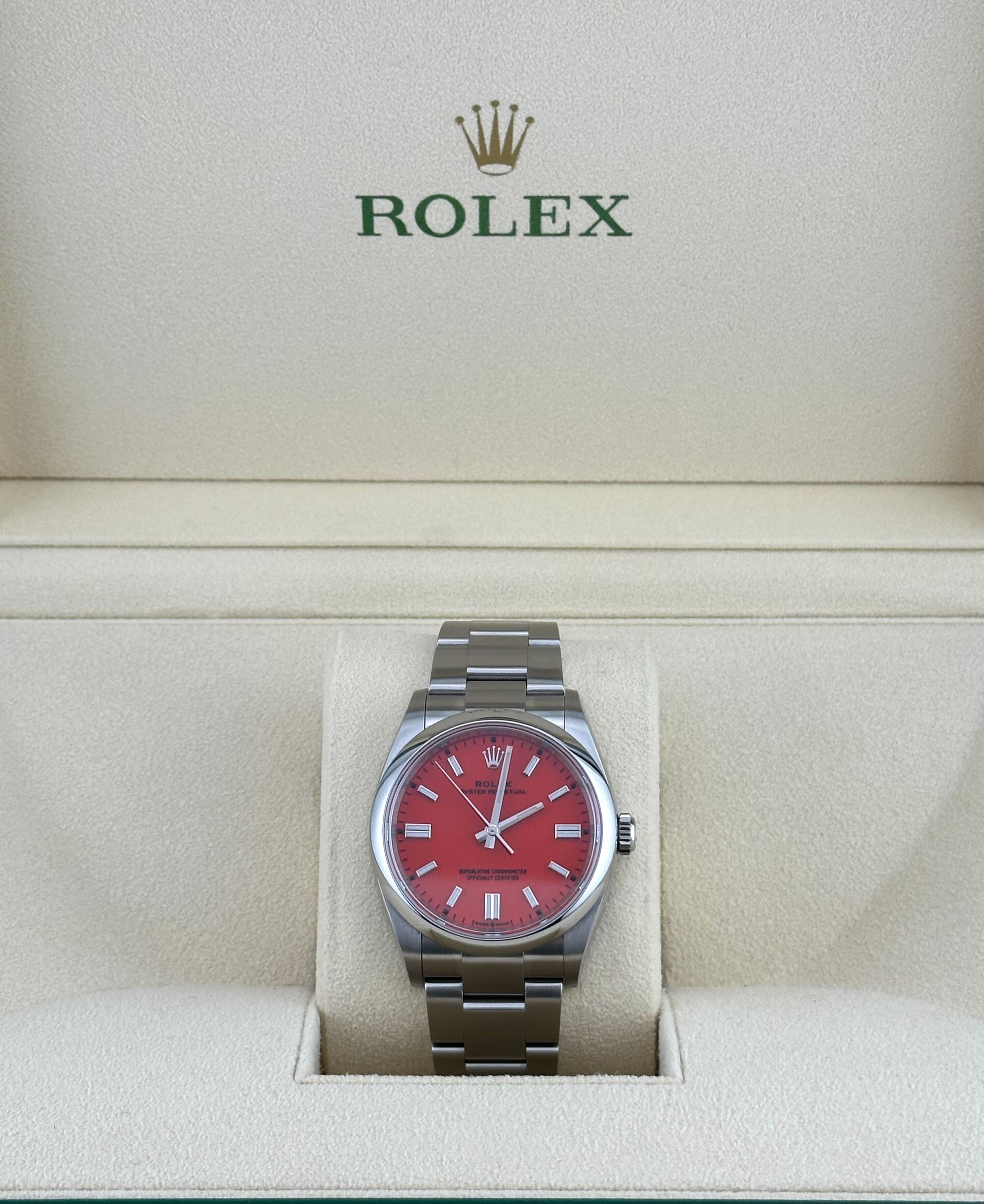 Rolex Oyster Perpetual 126000 Stainless Steel Coral Red Dial – Mavani & Co